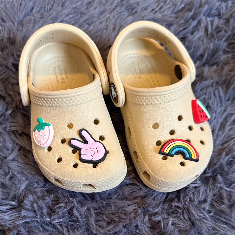CROCS Kids Cream Clogs with Colorful Charms
